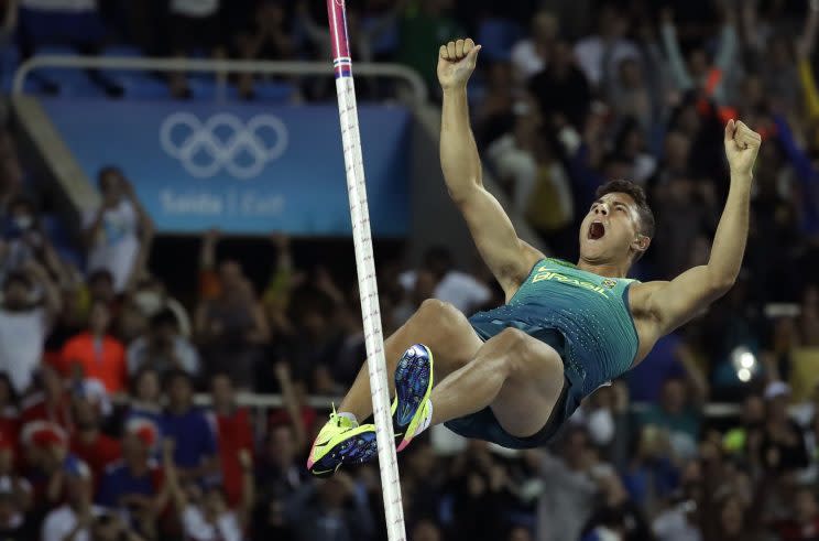 Brazil's Thiago Braz Da Silva celebrates after clearing the bar to set new Olympic record during the athletics competitions of the 2016 Summer Olympics at the Olympic stadium in Rio de Janeiro, Brazil, Tuesday, Aug. 16, 2016. (AP)