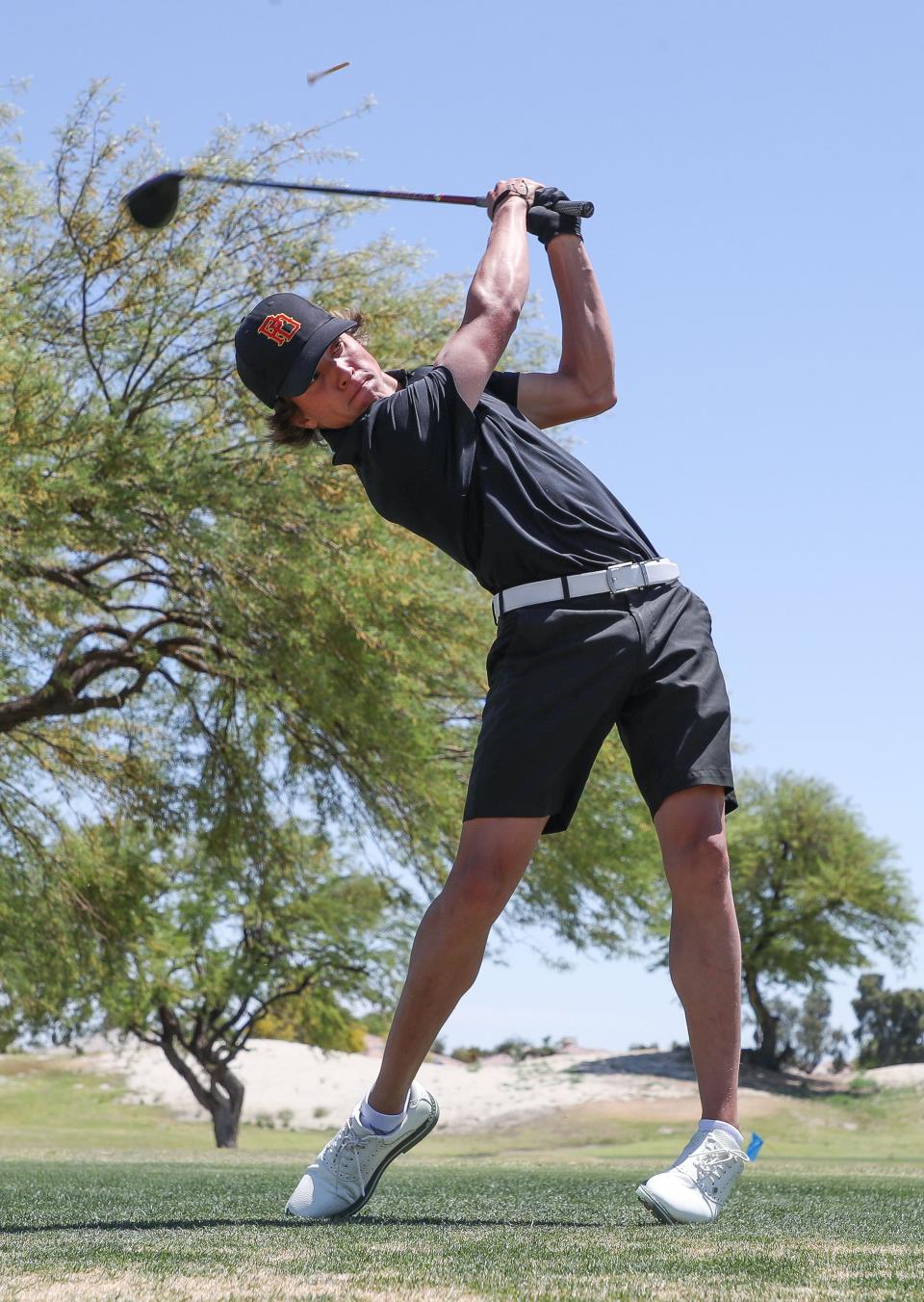 Caden Breisch tees off on the first hole for Palm Desert High School during the Desert Empire League golf championships at the Mission Hills North Gary Player Signature Course in Rancho Mirage, Calif.,  May 3, 2023.