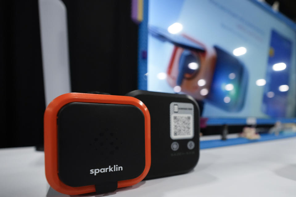 A Sparklin SPARK 1 socket is seen during CES Unveiled before the start of the CES tech show Sunday, Jan. 7, 2024, in Las Vegas. The socket is a smart charging outlet for electric and hybrid vehicles. (AP Photo/Ryan Sun)
