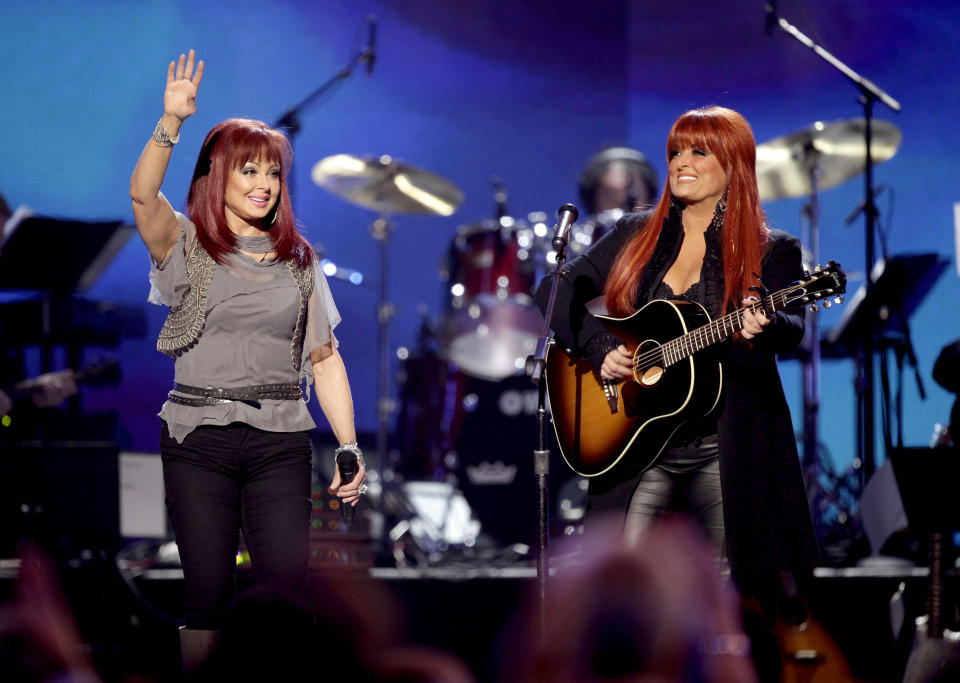 FILE - Naomi Judd, left, and Wynonna Judd, of The Judds, perform at the "Girls' Night Out: Superstar Women of Country," in Las Vegas, April 4, 2011. Judd's family filed a court petition Friday to seal police reports and recordings made during the investigation into her death. The family said the records contain video and audio interviews with relatives in the immediate aftermath of her death and releasing such details would inflict "significant trauma and irreparable harm.” Judd died at the age of 76 on April 30 at her home in Tennessee. (AP Photo/Julie Jacobson, File)