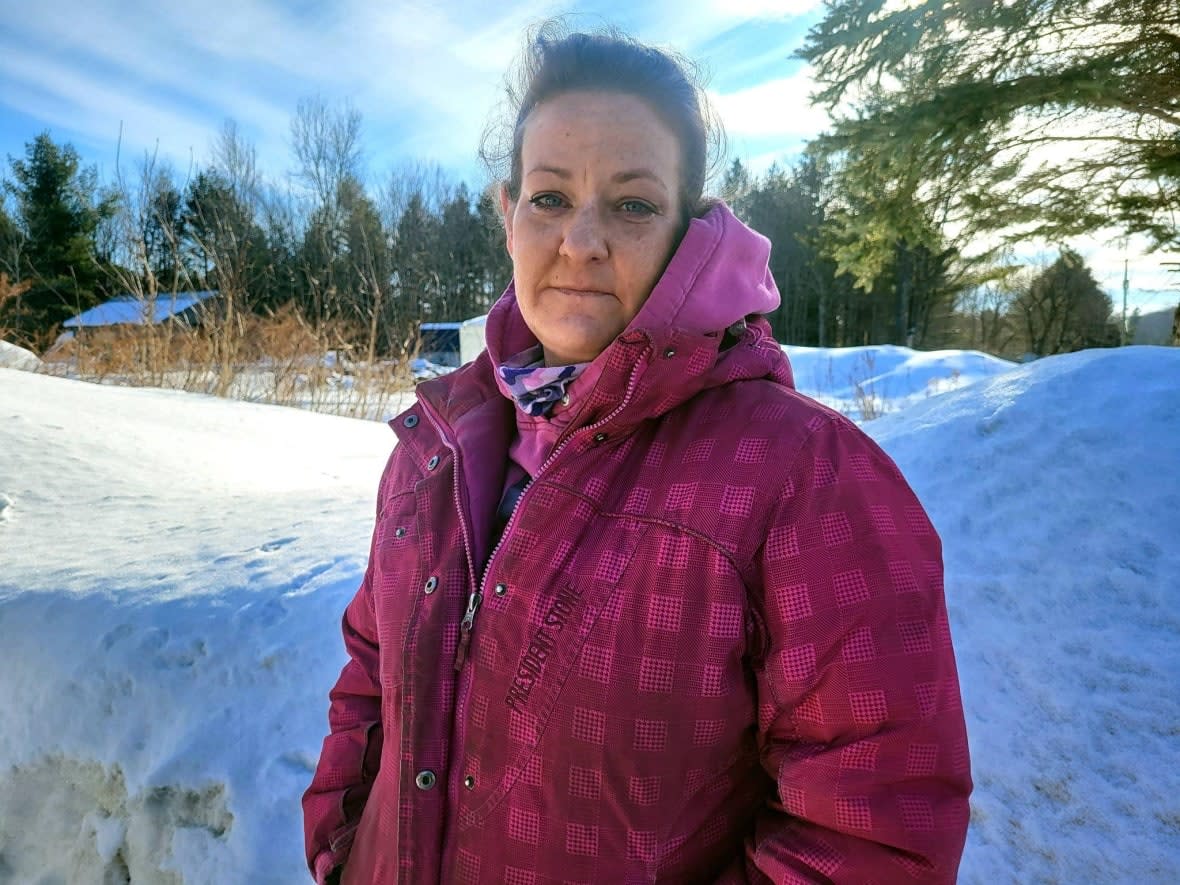 Mélanie Jalbert lives next to the home that caught on fire Thursday morning in the Lanaudière region, killing a family of six. (Kwabena Oduro/CBC - image credit)