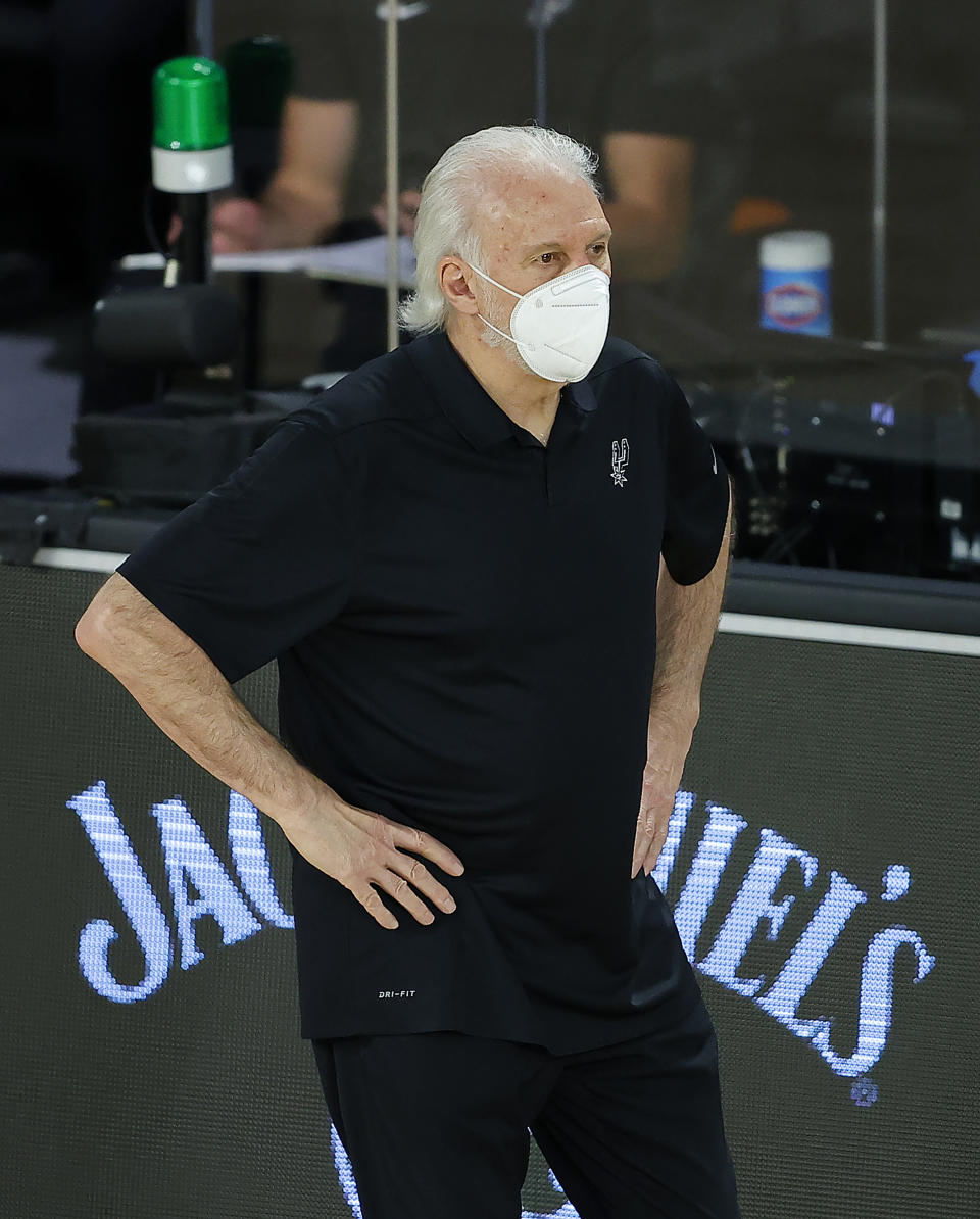 San Antonio Spurs head coach Gregg Popovich watches during the second half of an NBA basketball game against the Utah Jazz Friday, Aug. 7, 2020, in Lake Buena Vista, Fla. (Kevin C. Cox/Pool Photo via AP)