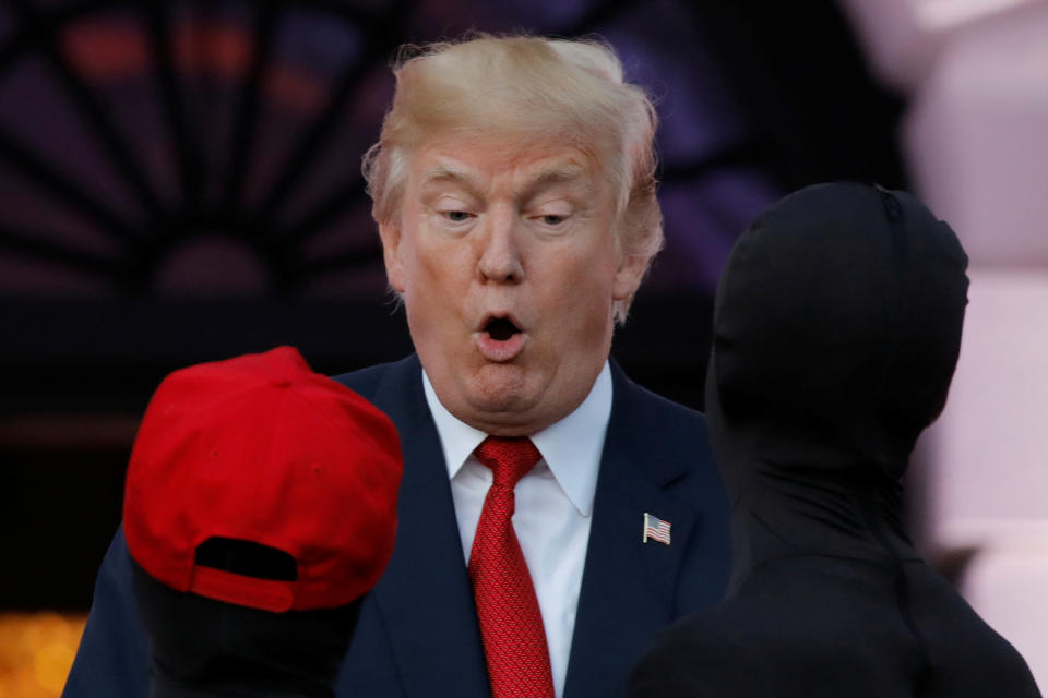 <p>U.S. President Donald Trump reacts as he and First Lady Melania Trump (not pictured) give out Halloween treats to children at the South Portico of the White House in Washington, D.C. on Oct. 30, 2017. (Photo: Carlos Barria/Reuters) </p>