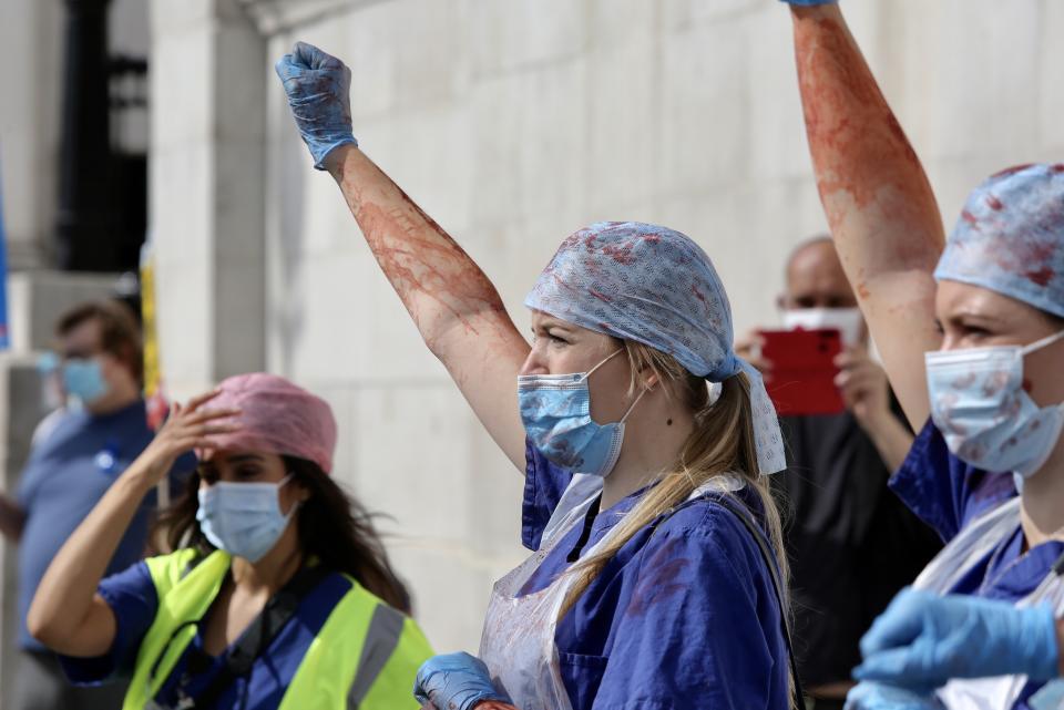 LONDON, UNITED KINGDOM- SEPTEMBER 12: NHS workers attend the 'March for Pay' Demonstration  in London, United Kingdom on September 12, 2020. (Photo by Hasan Esen/Anadolu Agency via Getty Images)