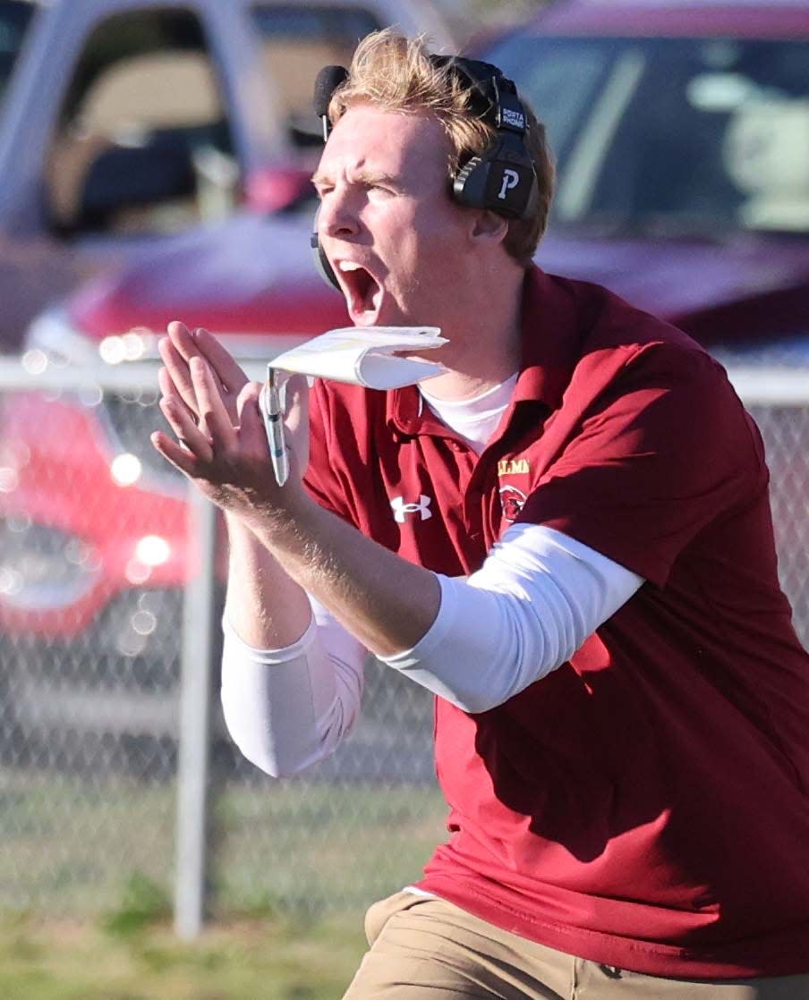 Cardinal Spellman coach Ryan Donovan celebrates in the fourth quarter during a game versus Blackstone Valley Tech on Saturday, Nov. 12, 2022.