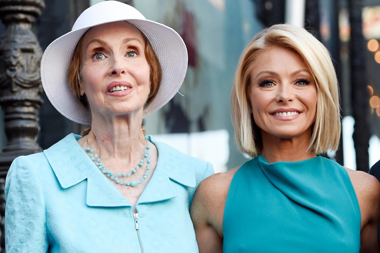 Television personality Kelly Ripa, center, poses with her parents Esther, left, during a ceremony to award her a star on the Hollywood Walk of Fame, in Los Angeles Kelly Ripa Honored With a Star on the Hollywood Walk of Fame, Los Angeles, USA