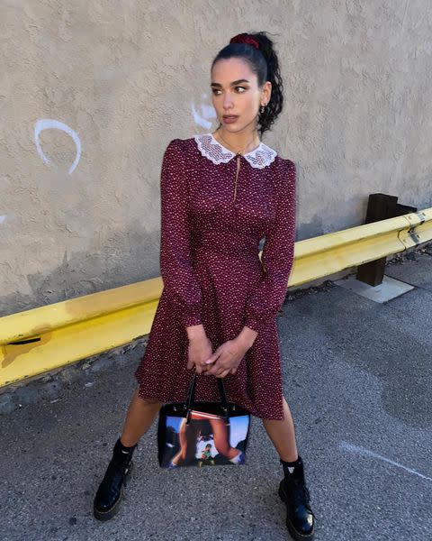 <p>Captioning the post 'schools out', Lipa wore a prim tea dress by Marc Jacobs. paired with chunky Dr Martens boots and a bag by Mowalola.</p><p><a class="link " href="https://www.drmartens.com/uk/en_gb/" rel="nofollow noopener" target="_blank" data-ylk="slk:SHOP DR MARTENS NOW;elm:context_link;itc:0;sec:content-canvas">SHOP DR MARTENS NOW</a></p><p><a href="https://www.instagram.com/p/CL-Q0fysmhm/" rel="nofollow noopener" target="_blank" data-ylk="slk:See the original post on Instagram;elm:context_link;itc:0;sec:content-canvas" class="link ">See the original post on Instagram</a></p>