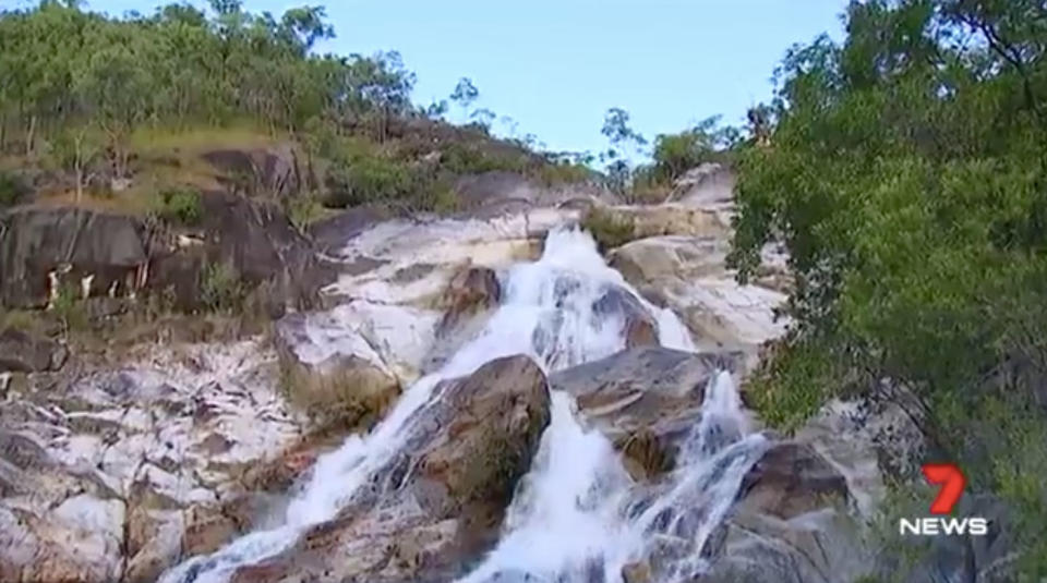 A 17-year-old girl is in critical condition after plunging from a waterfall in Queensland. Source: 7 News