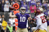 Washington quarterback Jacob Eason sets up to pass against Southern Cal in the first half of an NCAA college football game Saturday, Sept. 28, 2019, in Seattle. (AP Photo/Elaine Thompson)