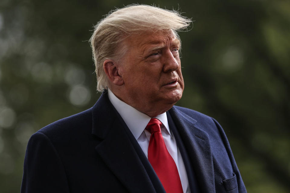 President Donald Trump talks to members of the media before boarding Marine One from the South Lawn of the White House.