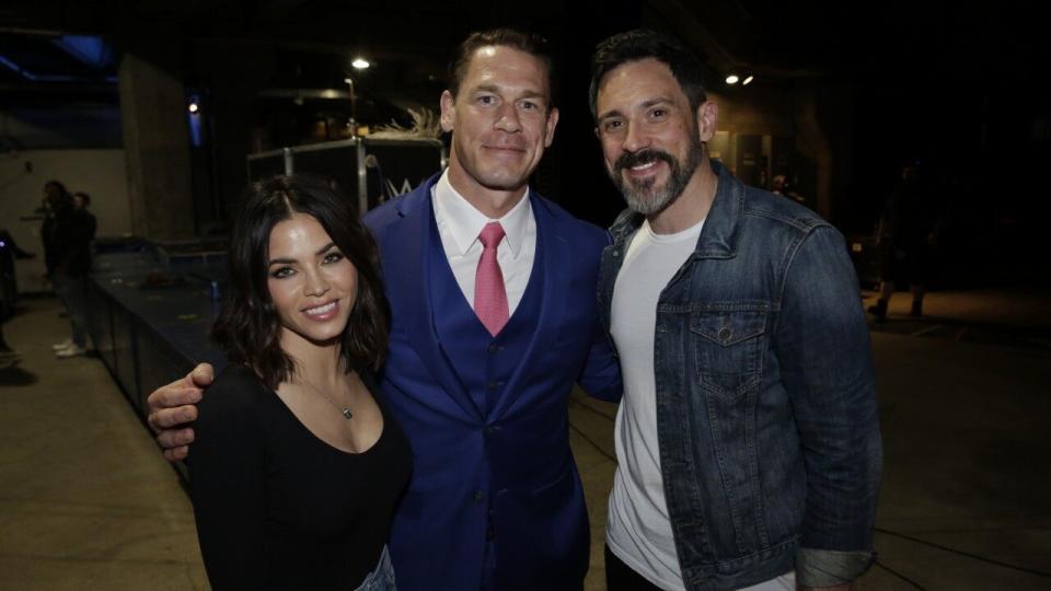 The couple cozied up on the sidelines, and even posed for pics with John Cena.