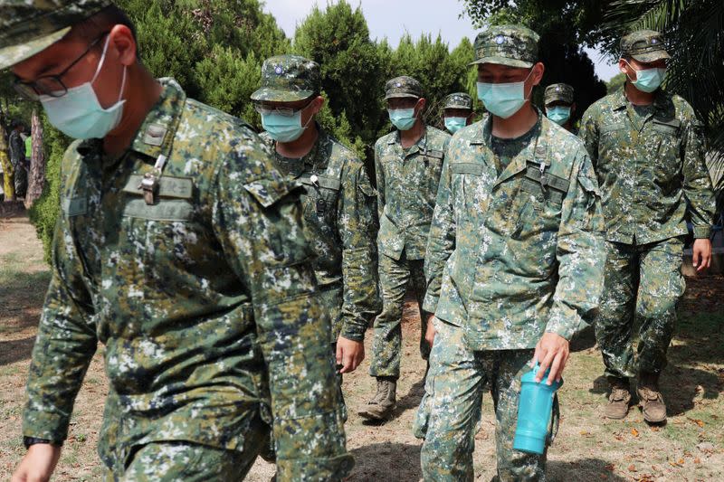 Soldiers wear face masks to prevent the spread of the coronavirus disease (COVID-19) at an event to mark the 62nd anniversary of the Second Taiwan Strait crisis in Kinmen,