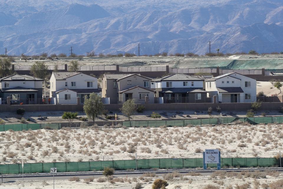 Graded land, new homes, and land for sale can be seen in the University Park development in Palm Desert, Nov. 28, 2022. 