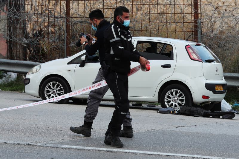 Israeli security forces cordon off an area at the scene of what Israeli police said was an attempted car-ramming attack at a checkpoint in East Jerusalem
