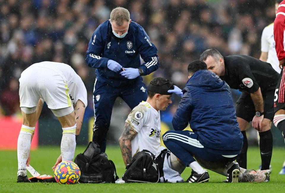 Leeds player Robin Koch is assessed by medical staff (Getty Images)