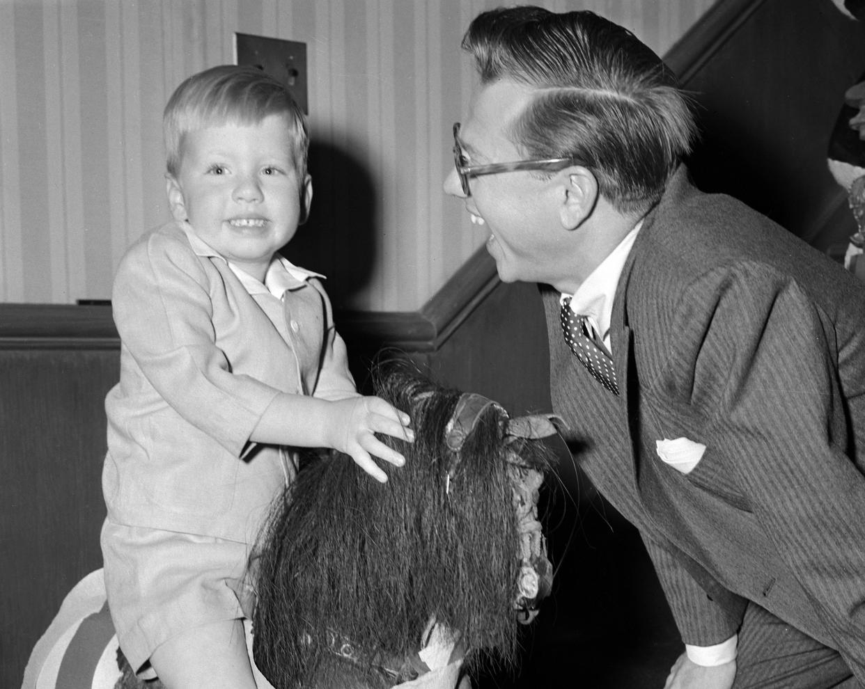 Actor Mickey Rooney enjoys a visit with his son, Mickey, Jr., 2, in 1948. 