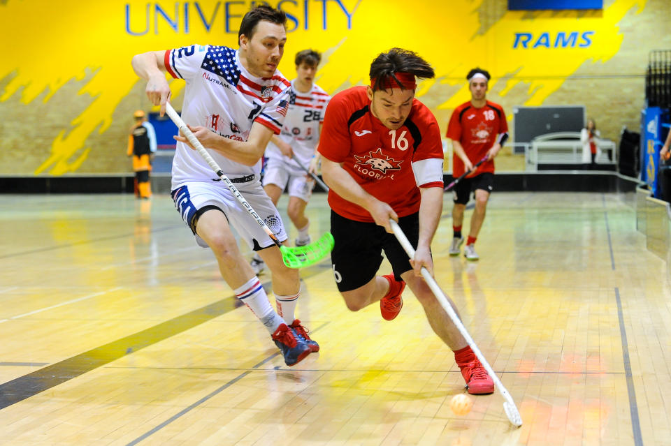 Floorball action between the United States (white jerseys) and Canada at the North American World Championship qualifiers. 