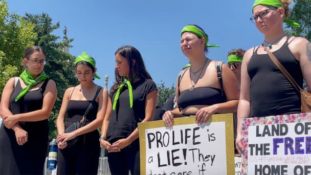 PHOTO: Abortion suporters hold signs protesting outside the Supreme Court in Washington, D.C., on July 11, 2022. (ABC News)