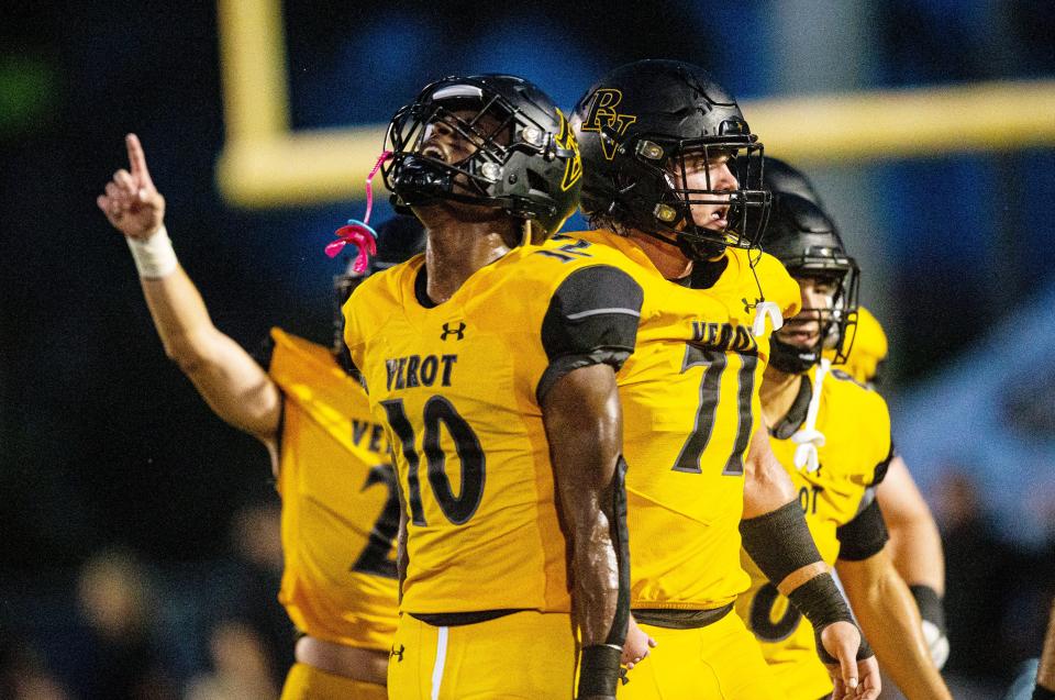 Leroy Roker #10 of the of Bishop Verot football reacts after a big stop on fourth down against Port Charlotte during the first football game of the season at Bishop Verot on Thursday, August 24, 2023. Bishop Verot routed Port Charlotte. On the right is Ryan Peterson