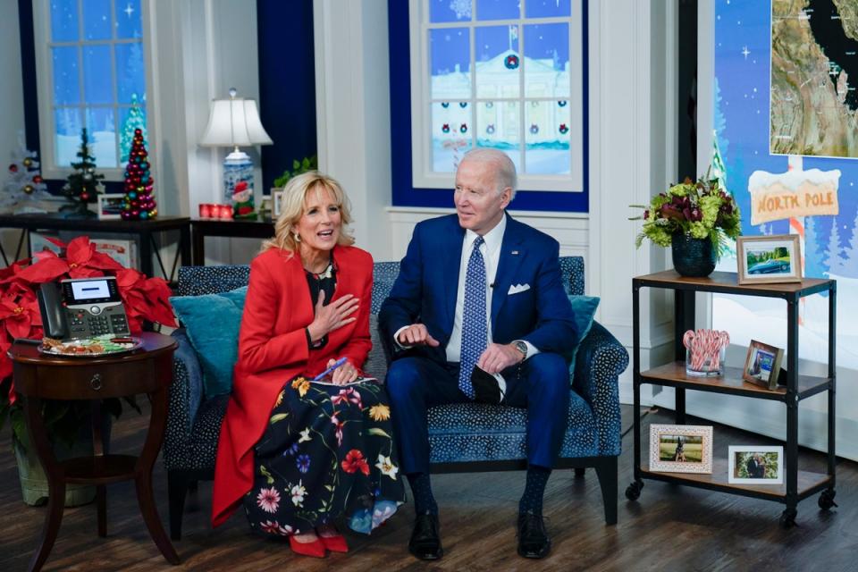 President Joe Biden and first lady Jill Biden speak with the NORAD Tracks Santa Operations Center (AP)