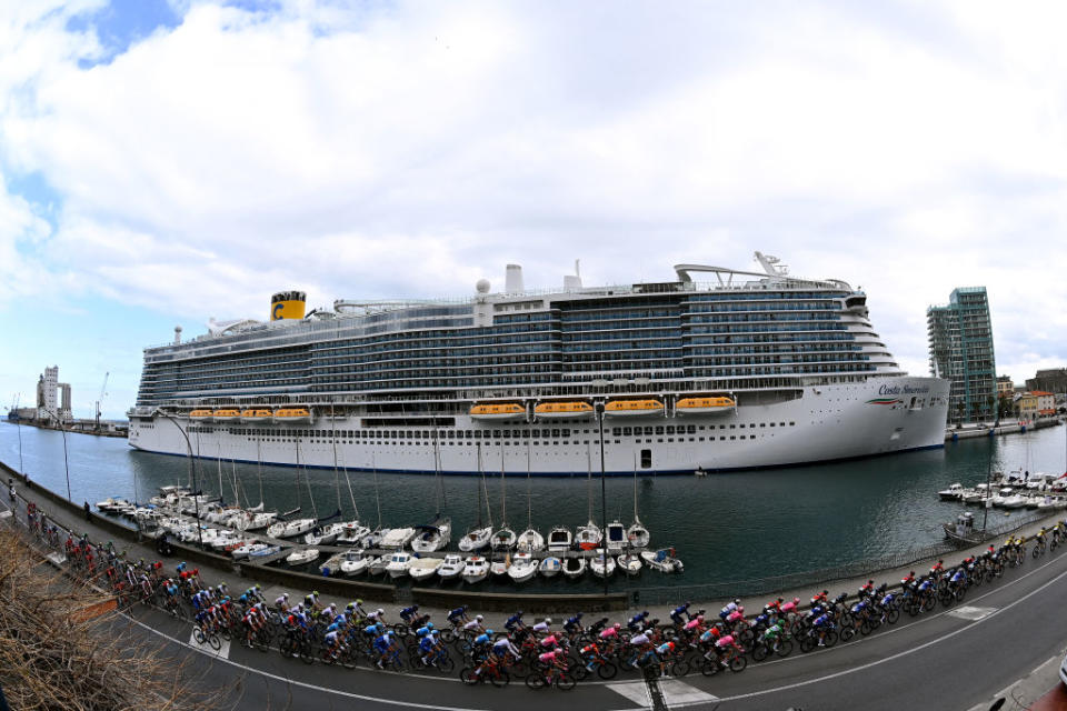 SANREMO ITALY  MARCH 18 General view of the peloton as it passes through the harbour of Savona city during the 114th MilanoSanremo 2023 a 294km one day race from Abbiategrasso to Sanremo  MilanoSanremo  UCIWT  on March 18 2023 in Sanremo Italy Photo by Tim de WaeleGetty Images