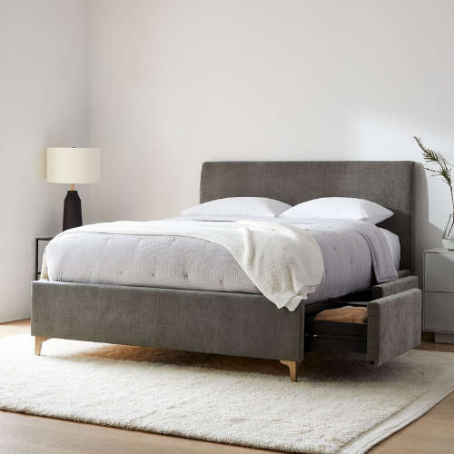 dark grey storage bed inside a bedroom