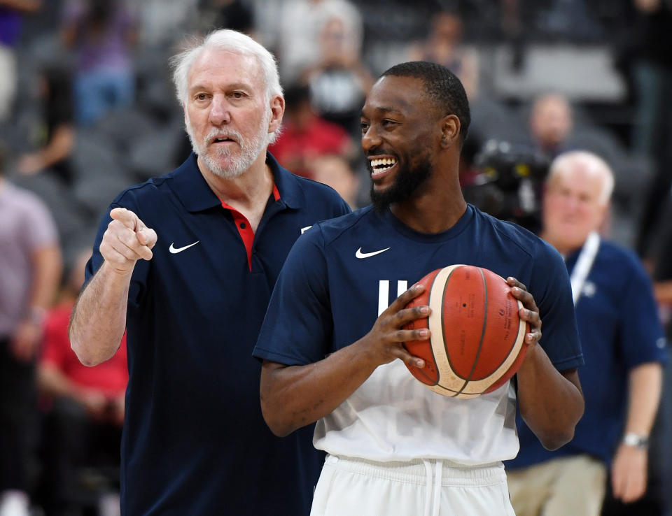 Spurs coach Gregg Popovich and new Celtics point guard Kemba Walker are first-time leaders for Team USA. (Getty Images)