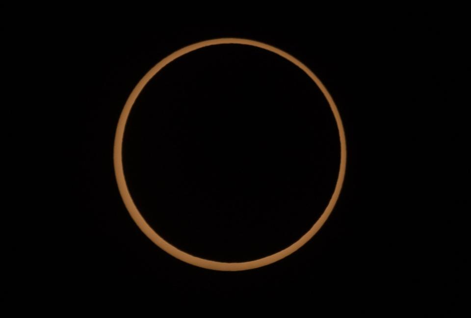 An annular solar eclipse is pictured in Torrey, Utah, on Saturday, Oct. 14, 2023. A phenomenon known as the “ring of fire” is visible because of the way the sun’s edges perfectly surround the moon. | Laura Seitz, Deseret News