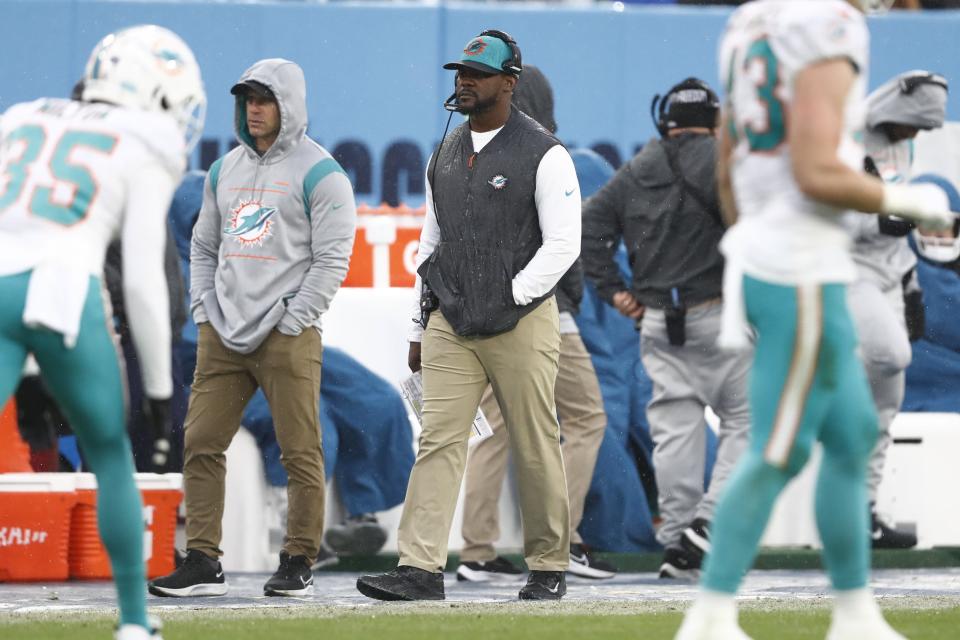 Dolphins coach Brian Flores,  on the sidelines of Sunday's game, could not have been happy with his team's performance in the crushing loss to the Titans.