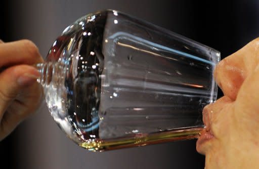 A mainland Chinese visitor samples French white wine during the Vinexpo Asia-Pacific trade fair in Hong Kong, on May 30. Fruity reds are the kings of the Chinese wine market, but experts at Asia's biggest wine fair say women are leading a trend toward whites that will open new revenue streams for producers worldwide