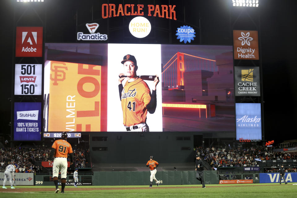 San Francisco Giants' Wilmer Flores (41) runs the bases after hitting a home run against the Los Angeles Dodgers during the third inning of a baseball game in San Francisco, Friday, Sept. 29, 2023. (AP Photo/Jed Jacobsohn)