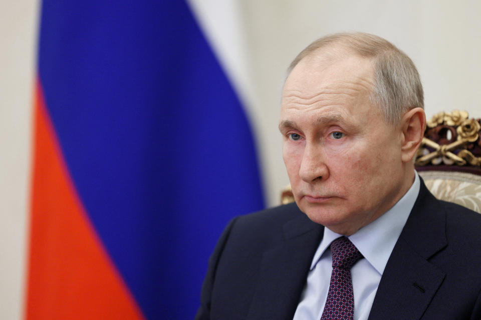 Russian President Vladimir Putin takes part in a ceremony via video link at the Kremlin in Moscow, Russia March 30, 2023. Sputnik/Gavriil Grigorov/Pool via REUTERS ATTENTION EDITORS - THIS IMAGE WAS PROVIDED BY A THIRD PARTY.