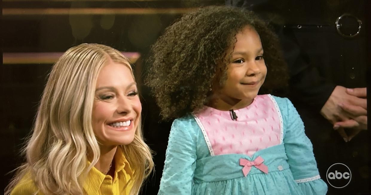 'Generation Gap' host Kelly Ripa offers a youngster the choice between a real SUV and a toy go-kart.