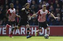 Britain Football Soccer - Southampton v Hull City - Premier League - St Mary's Stadium - 29/4/17 Southampton's Steven Davis in action with Hull City's Lazar Markovic Reuters / Hannah McKay Livepic