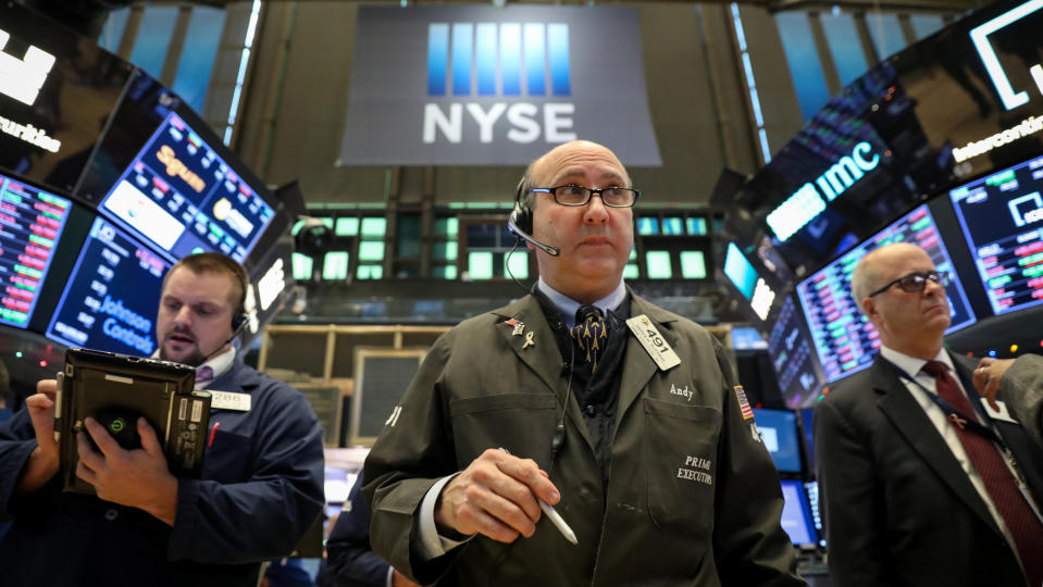 Traders work on the floor of the New York Stock Exchange (NYSE) in New York, U.S., December 10, 2018. REUTERS/Brendan McDermid