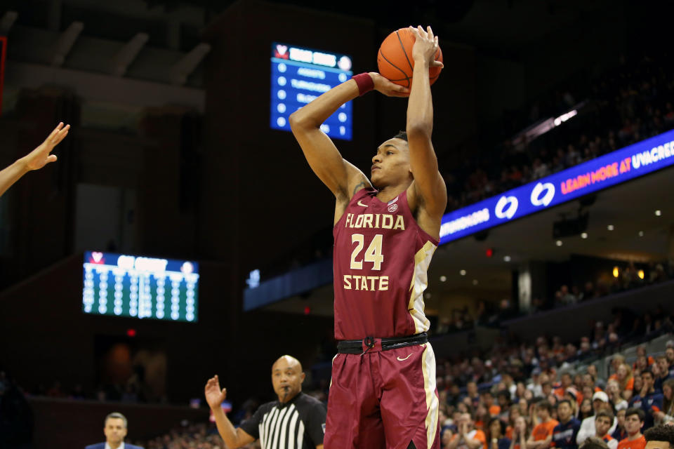 Devin Vassell #24 of the the Florida State Seminoles shoots in the first half during a game against the Virginia Cavaliers at John Paul Jones Arena.