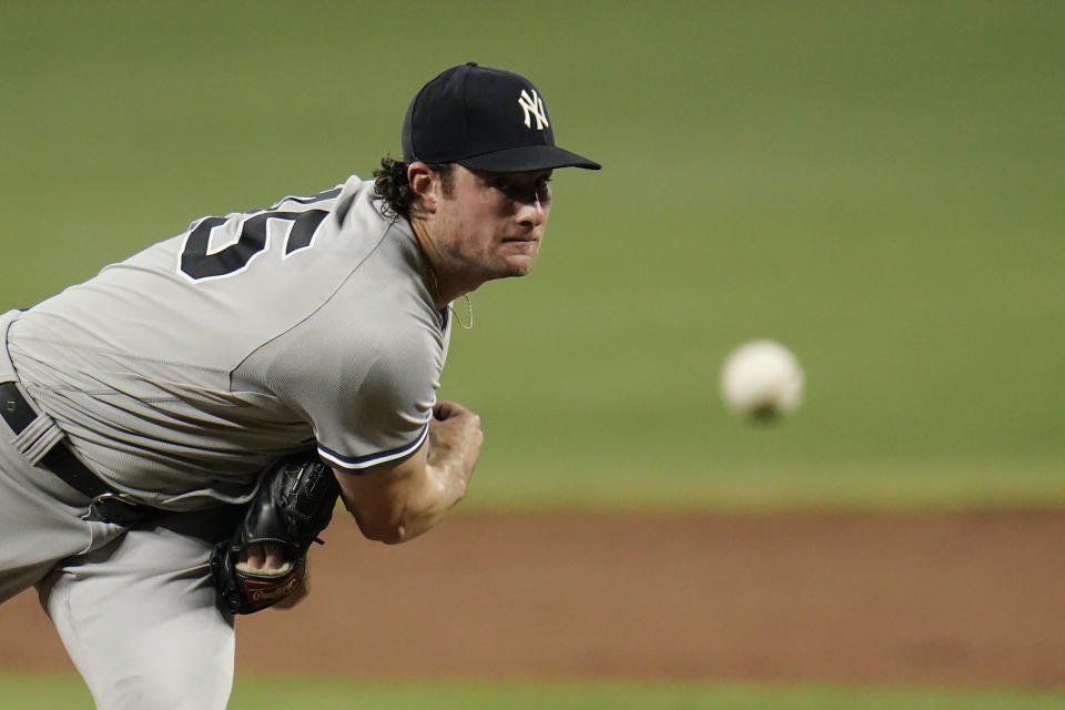 New York Yankees starting pitcher Gerrit Cole throws a pitch to the Baltimore Orioles during the second inning of a baseball game, Tuesday, Sept. 14, 2021, in Baltimore. (AP Photo/Julio Cortez)