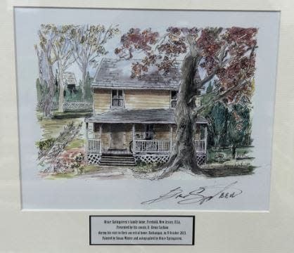 A painting of Bruce Springsteen's former home on 87 Randolph St. in Freehold by Susan Winter.