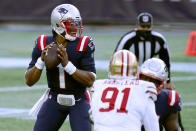 New England Patriots quarterback Cam Newton drops back to pass under pressure from San Francisco 49ers defensive end Arik Armstead (91) in the first half of an NFL football game, Sunday, Oct. 25, 2020, in Foxborough, Mass. (AP Photo/Charles Krupa)