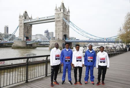 Britain Athletics - London Marathon Previews - London - 20/4/17 Abel Kirui of Kenya (L-R) Feyisa Lilesa of Ethiopia, Ghirmay Ghebreslassie of Eritrea, Bedan Karoki of Kenya and Kenenisa Bekele of Ethiopia ahead of the 2017 Virgin Money London Marathon Action Images via Reuters / Matthew Childs Livepic