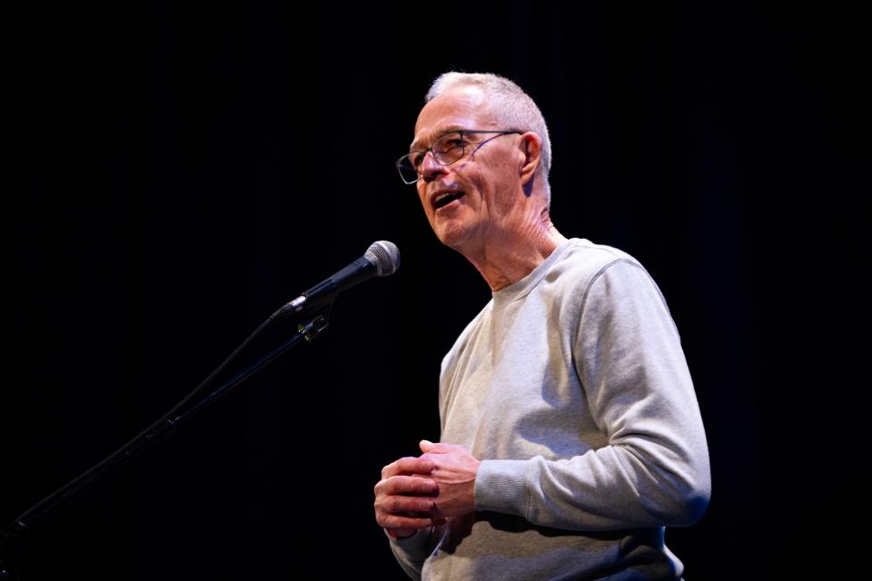 Storyteller Jim Sayers tells his story during the Des Moines Storytellers Project's "Community" show Tuesday, Feb. 27, 2024, at Hoyt Sherman Place in Des Moines.