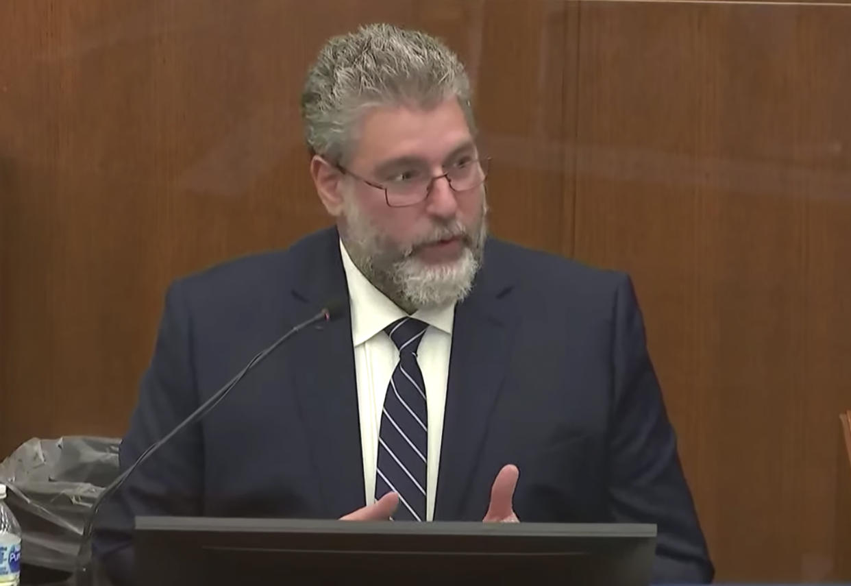 In this screen grab from video, Dr. Lorren Jackson, assistant medical examiner at Hennepin County, testifies as Hennepin County Judge Regina Chu presides over court Monday, Dec. 13, 2021, in the trial of former Brooklyn Center police Officer Kim Potter in the April 11, 2021, death of Daunte Wright, at the Hennepin County Courthouse in Minneapolis, Minn. (Court TV via AP, Pool)