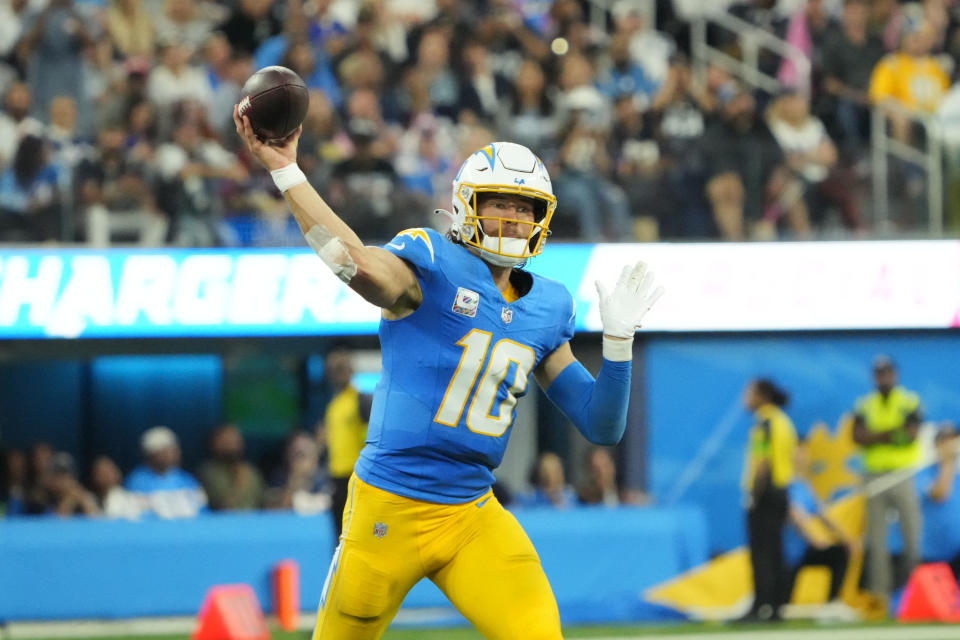 Oct 16, 2023; Inglewood, California, USA; Los Angeles Chargers quarterback <a class="link " href="https://sports.yahoo.com/nfl/players/32676" data-i13n="sec:content-canvas;subsec:anchor_text;elm:context_link" data-ylk="slk:Justin Herbert;sec:content-canvas;subsec:anchor_text;elm:context_link;itc:0">Justin Herbert</a> (10) throws the ball against the Dallas Cowboys in the second half at SoFi Stadium. Mandatory Credit: Kirby Lee-USA TODAY Sports