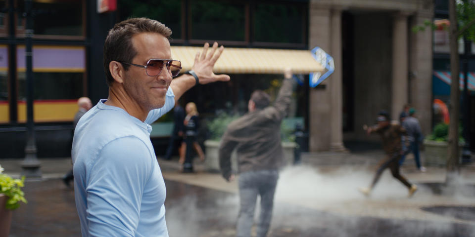 This image released by 20th Century Studios shows Ryan Reynolds in a scene from "Free Guy." (20th Century Studios via AP)