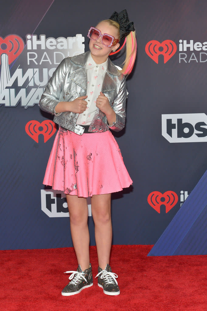 INGLEWOOD, CA - MARCH 11:  JoJo Siwa arrives at the 2018 iHeartRadio Music Awards which broadcasted live on TBS, TNT, and truTV at The Forum on March 11, 2018 in Inglewood, California.  (Photo by Rachel Murray/Getty Images)