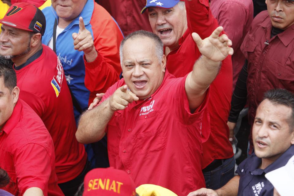 Venezuela's Socialist Party boss Diosdado Cabello takes part in a protest against Michelle Bachelet, U.N. high commissioner for human rights, in Caracas, Venezuela, Saturday, July 13, 2019. Bachelet recently published a report accusing Venezuelan officials of human rights abuses, including extrajudicial killings and measures to erode democratic institutions. (AP Photo/Leonardo Fernandez)