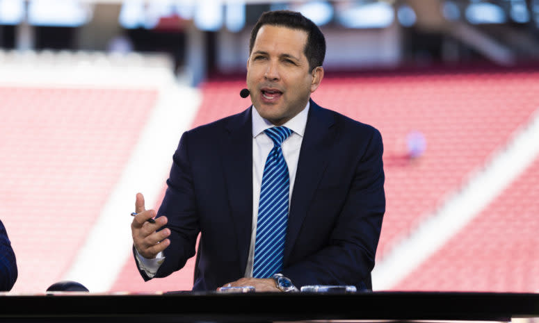 ESPN NFL insider Adam Schefter on the field.