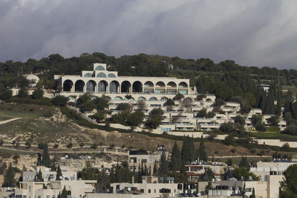 This Thursday, Dec. 13, 2012 photo shows the Mormon university building, one of Jerusalem's tourist destinations, located on Mount Scopus. Beyond its earthly past, Jerusalem has an impossible beauty with broad appeal. For residents and tourists, secular and religious souls, city slickers or nature lovers, there is always an unexplored alleyway, street corner or vista that will show you the city as you’ve never seen it before. (AP Photo/Ariel Schalit)