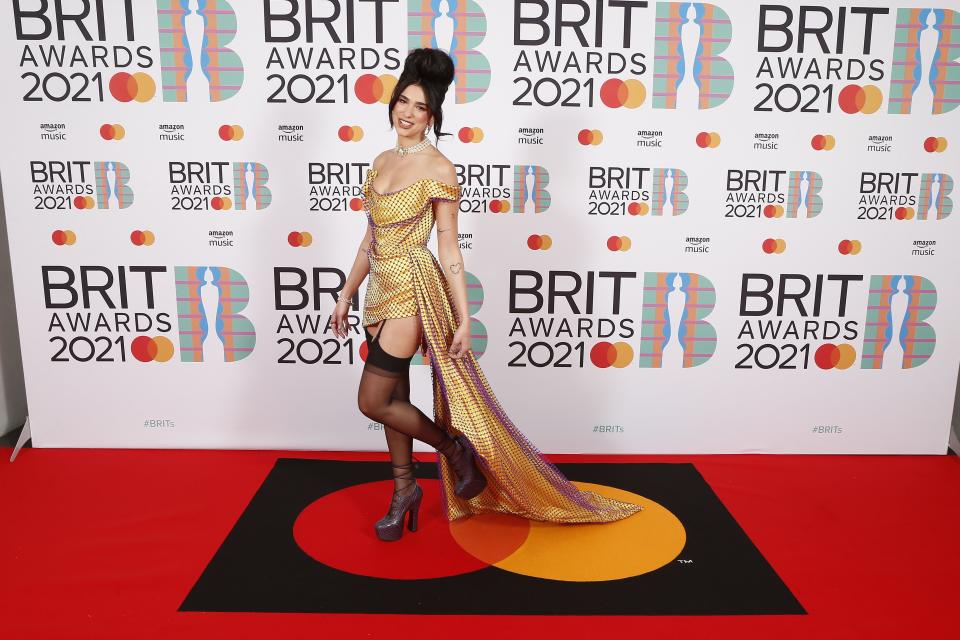 <p>The 2021 Brit Awards was an extra special one this year, being one of the first major in-person events to have taken place since the pandemic took hold of the UK. </p><p>The event saw 4,000 people in attendance with no social distancing or masks required (with attendees instead taking tests before and after the event). The awards ceremony had been chosen to be part of the government’s Events Research Programme, which will evaluate how venues can restart large events and welcome crowds back safely this summer. This makes the Brits one of the first in-person award ceremonies to take place without any virtual element to it at all – and saw performances from some big names, including Coldplay and The Weeknd.</p><p>Below, we round up all the fashion you need to see from the red carpet. From Dua Lipa in Vivienne Westwood to perfect outfit co-ordination from Haim, here are the most memorable fashion moments from the 2021 Brit Awards.</p>