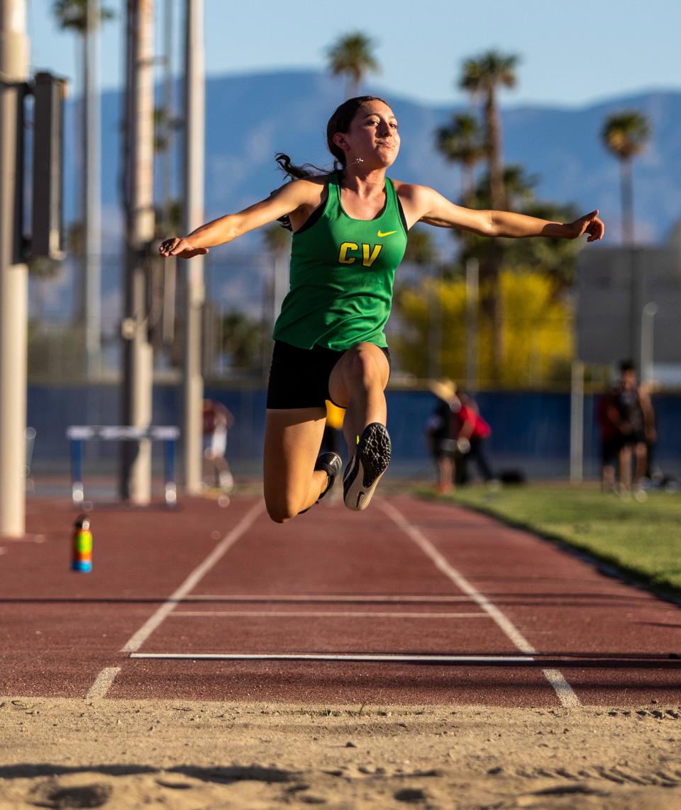 Coachella Valley's Angelica Villarreal, shown here competing in the girls' triple jump in Indio, Calif. on April 26, 2023, set the new school record and the 2024 DVL finals on Thursday.